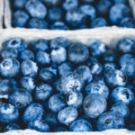 Blueberries in crates on a table