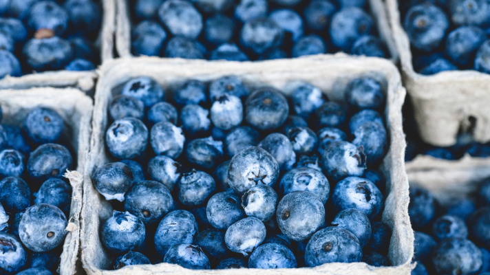 Blueberries in crates on a table